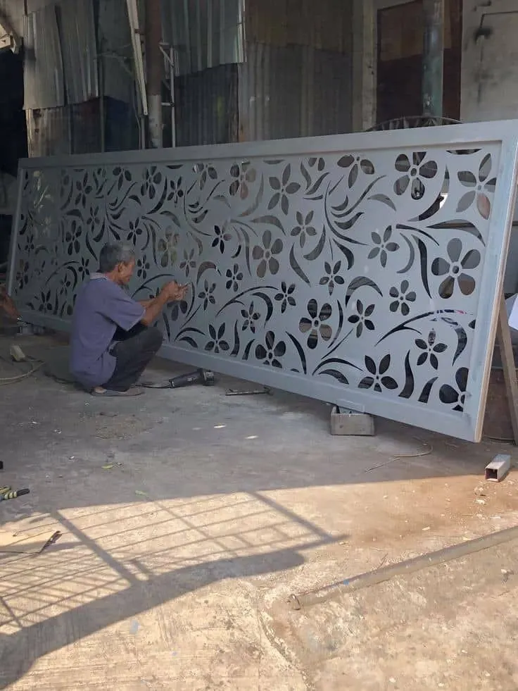 Floral cut metal grill panel