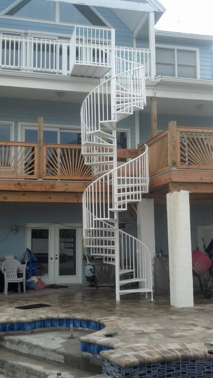 Outdoor spiral staircase installation
