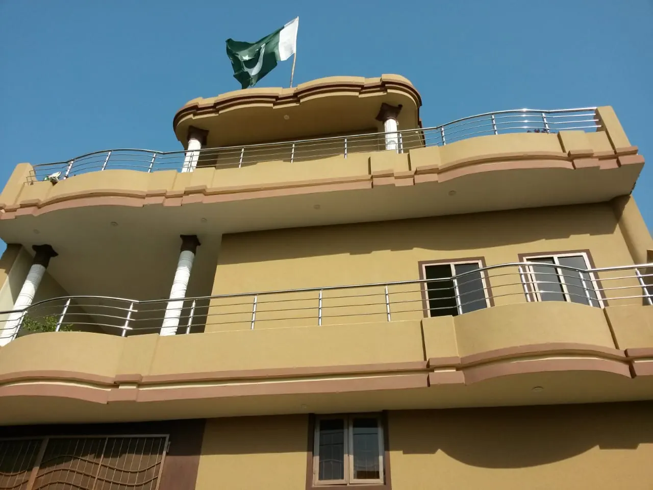 Building facade with steel balcony railings