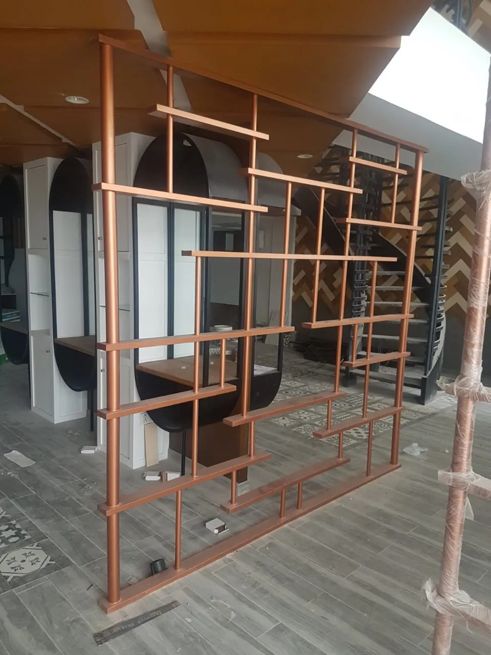 Copper-finish metal room divider